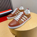 Three-Stripe Color-Block Sneaker — Red & Black Sole Detail