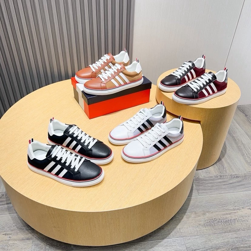 Three-Stripe Color-Block Sneaker — Red & Black Sole Detail